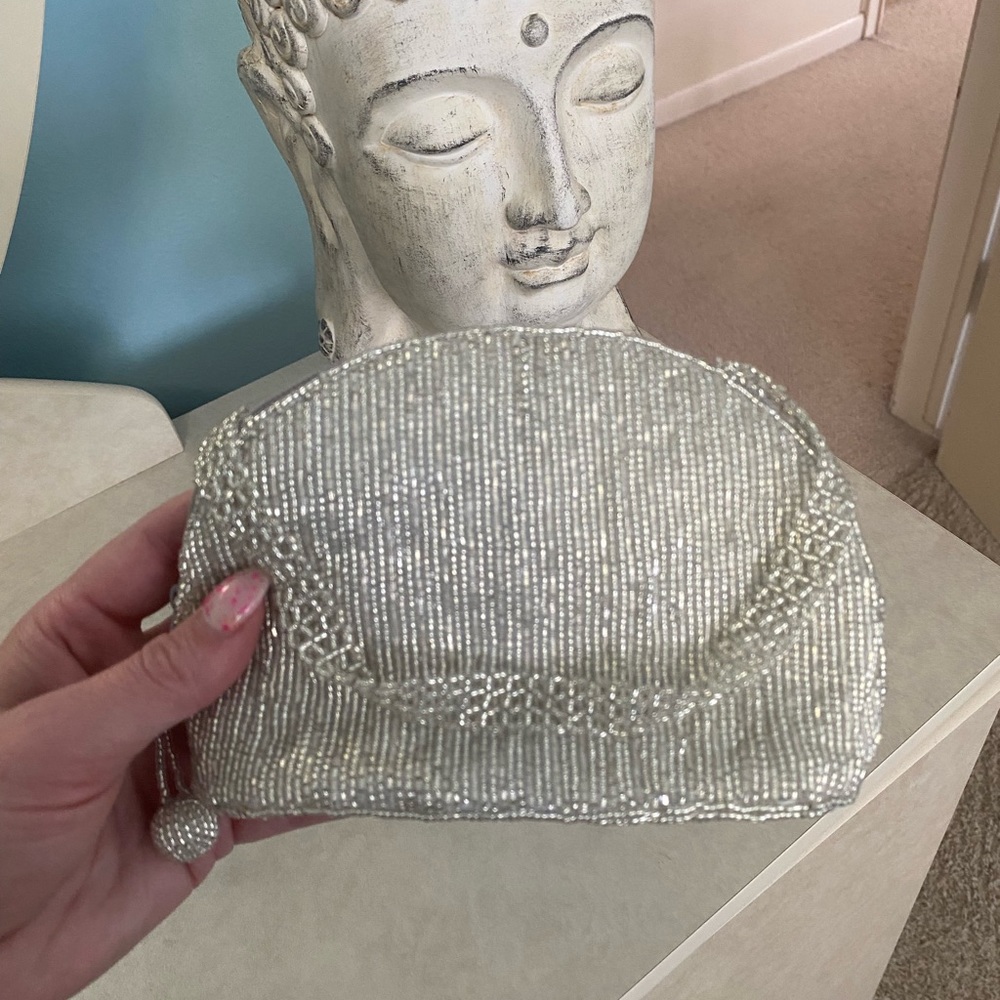 Cache small silver formal bag